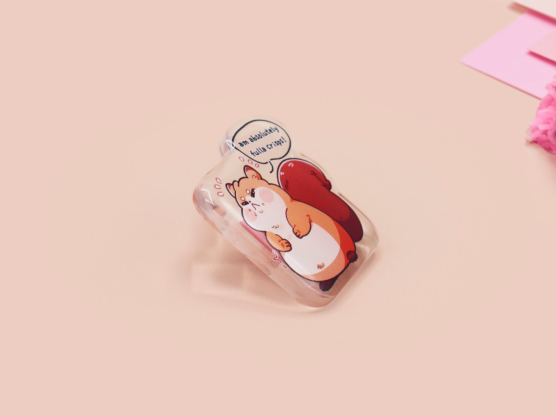 A cute transparent acrylic pin badge of a fat chibi squirrel stressing out with a speech that says am absolutely fulla crisps, the quote is from the viral Scottish meme.