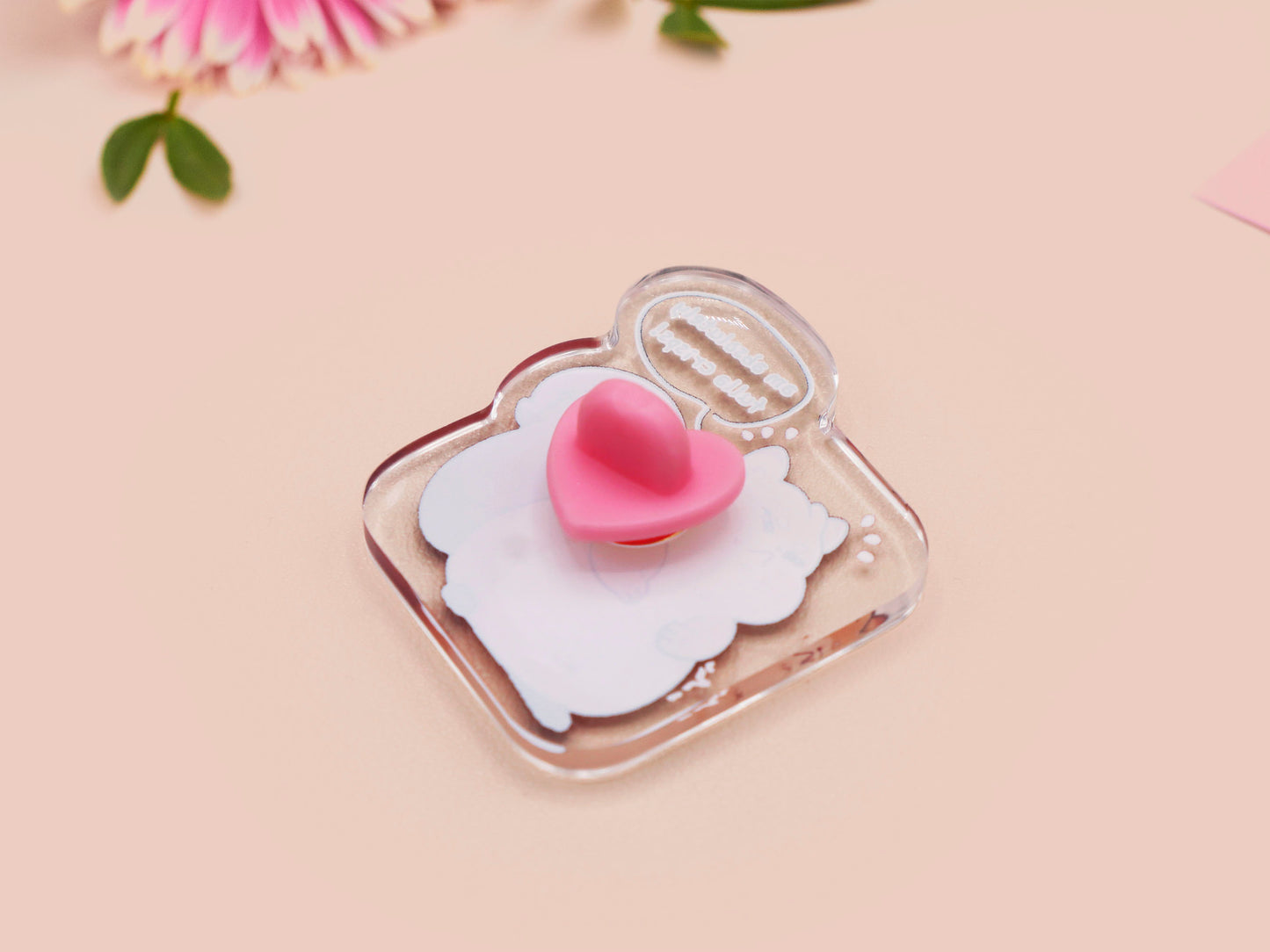 A cute transparent acrylic pin badge with a pink heart-shaped rubber clasp pin back of a fat chibi squirrel stressing out with a speech that says am absolutely fulla crisps, the quote is from the viral Scottish meme.