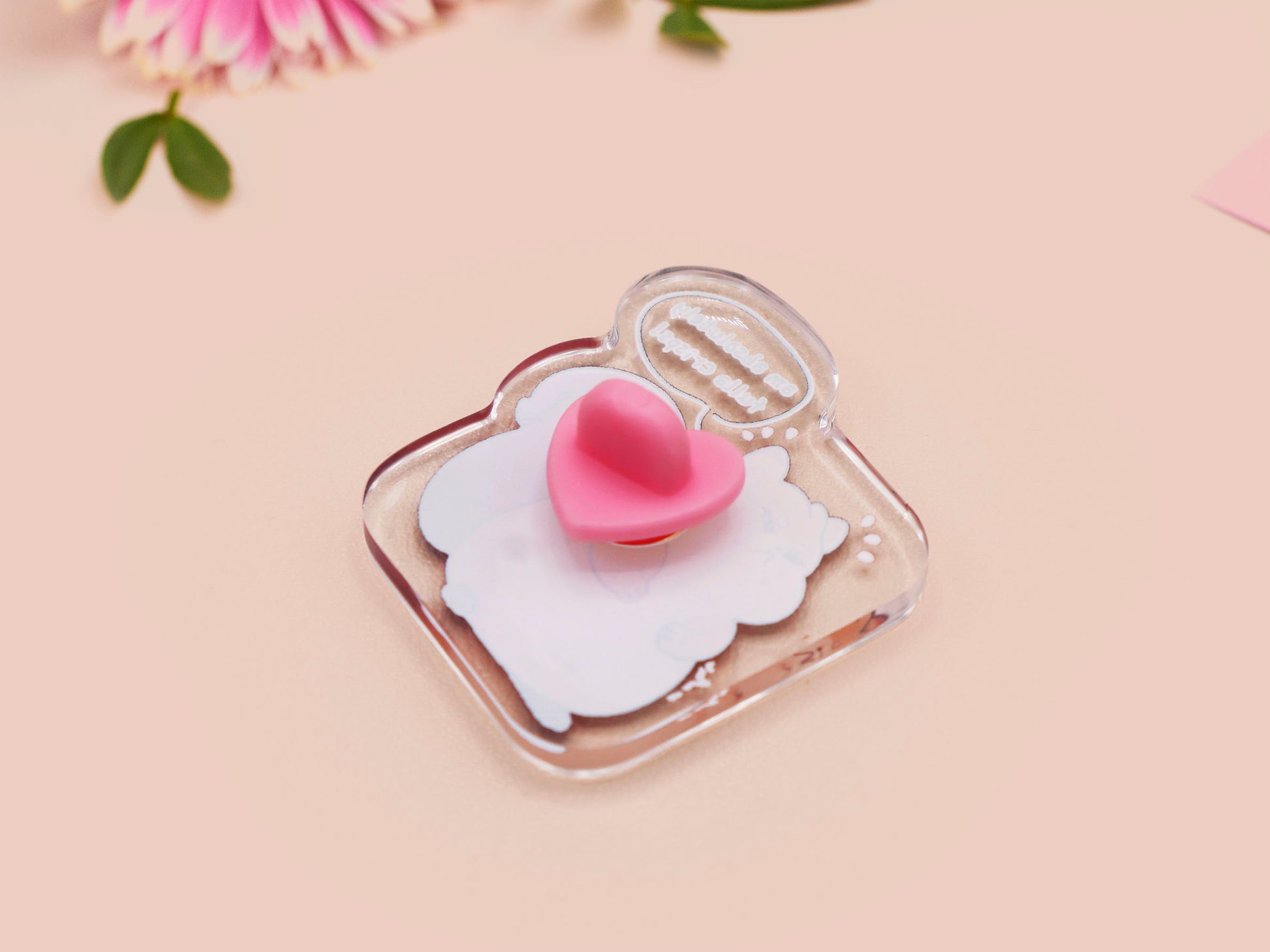 A cute transparent acrylic pin badge with a pink heart-shaped rubber clasp pin back of a fat chibi squirrel stressing out with a speech that says am absolutely fulla crisps, the quote is from the viral Scottish meme.