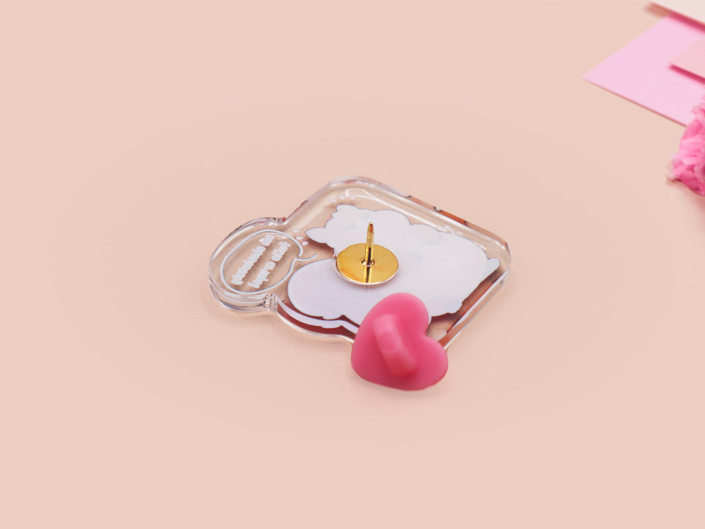 A cute transparent acrylic pin badge with a pink heart-shaped rubber clasp pin back of a fat chibi squirrel stressing out with a speech that says am absolutely fulla crisps, the quote is from the viral Scottish meme.