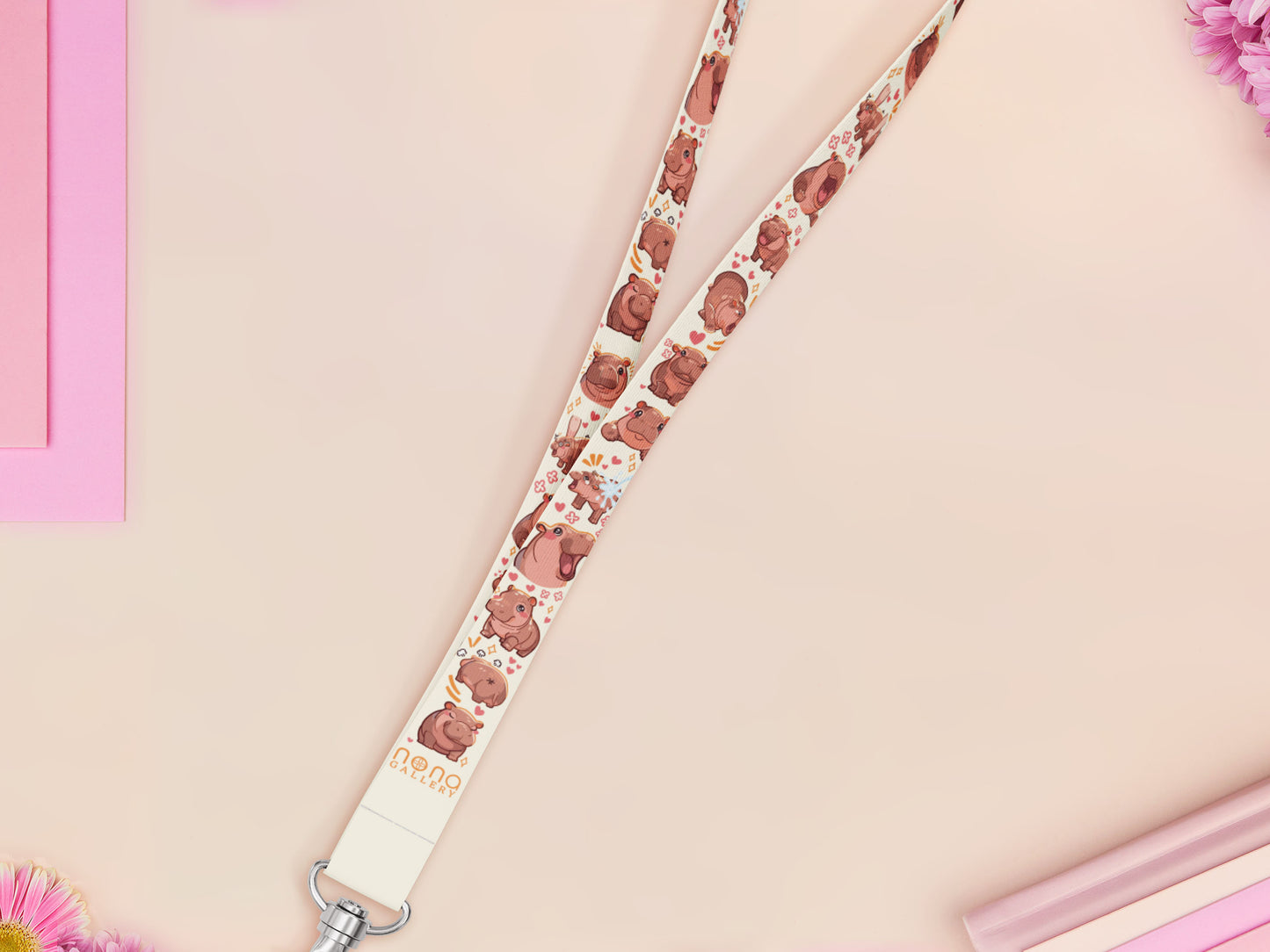 Cute full legth white lanyard with a double sided baby pygmy hippo Moo Deng pattern and silver swivel hook clasp.