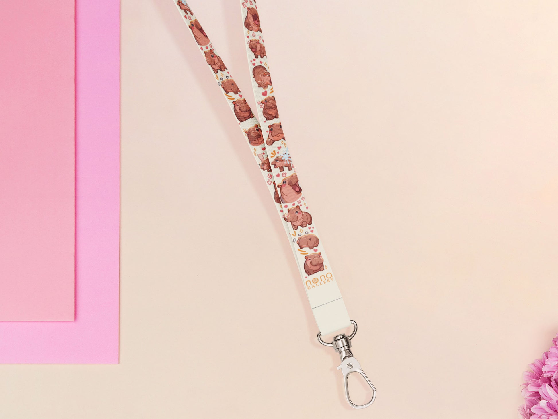 Cute full legth white lanyard with a double sided baby pygmy hippo Moo Deng pattern and silver swivel hook clasp.