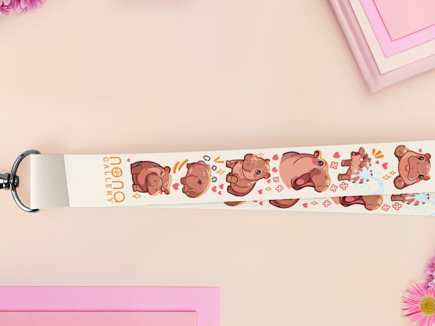 Cute full legth white lanyard with a double sided baby pygmy hippo Moo Deng pattern and silver swivel hook clasp.