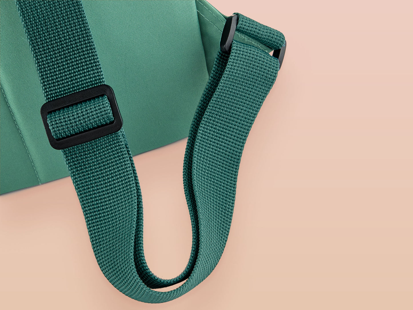 Green roll top twin handle backpack with an embroided design of cute space alien cat floating in the stars and the quote beam me up I want to leave!