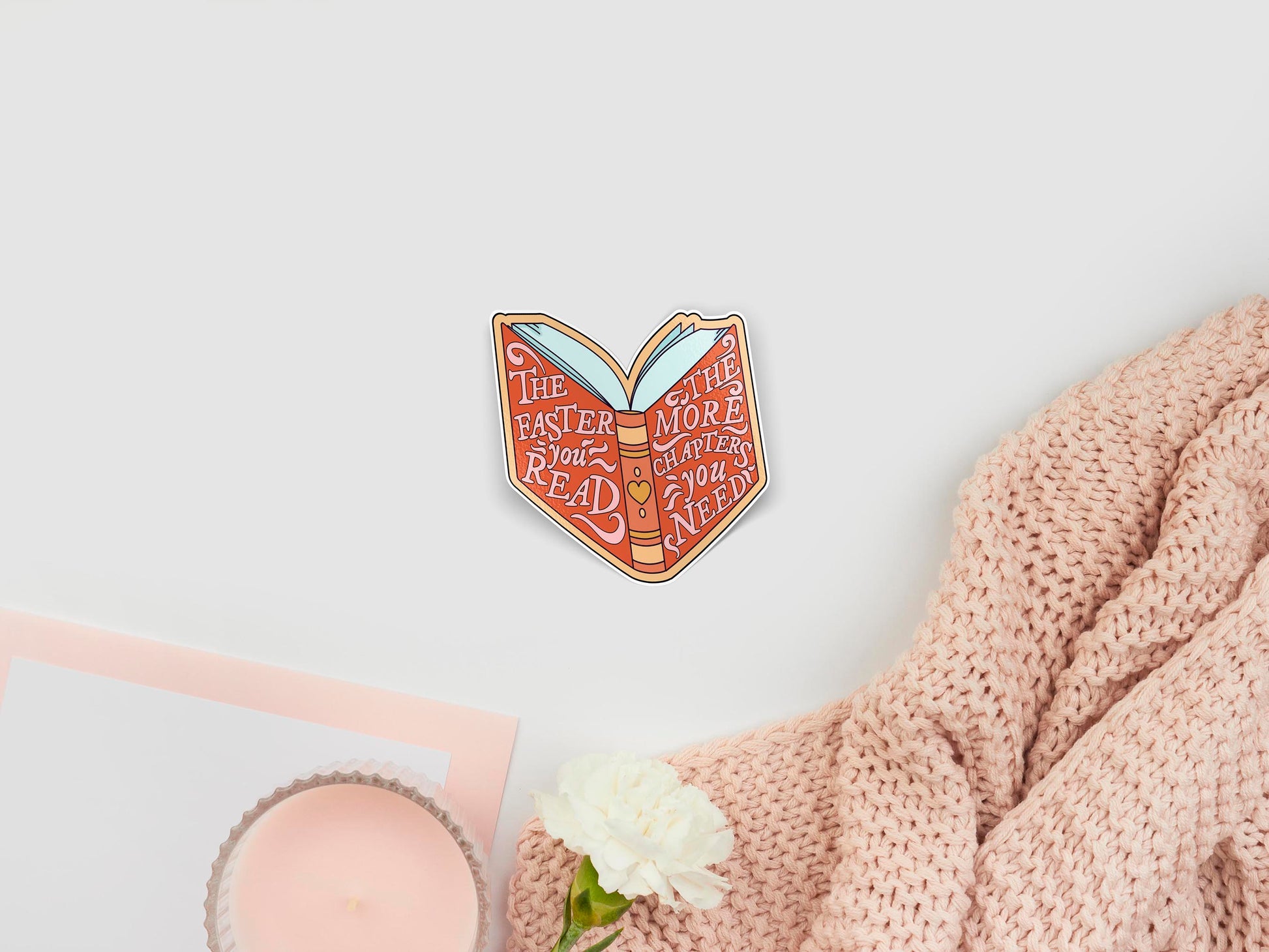 Large sticker of digital illustration cartoon of a cute open book, that's covers read the faster you read the more chapters you need