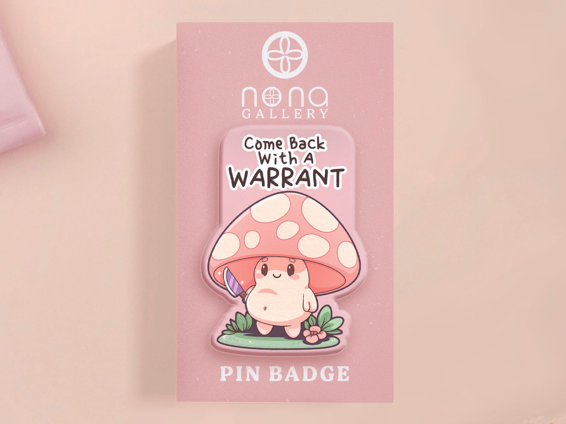 This cute transparent acrylic pin badge has a pink rubber heart shrimp pin-back clasp. The design is of a chibi cartoon mushroom with the text "Come back with a warrant."