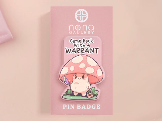 This cute transparent acrylic pin badge has a pink rubber heart shrimp pin-back clasp. The design is of a chibi cartoon mushroom with the text "Come back with a warrant."