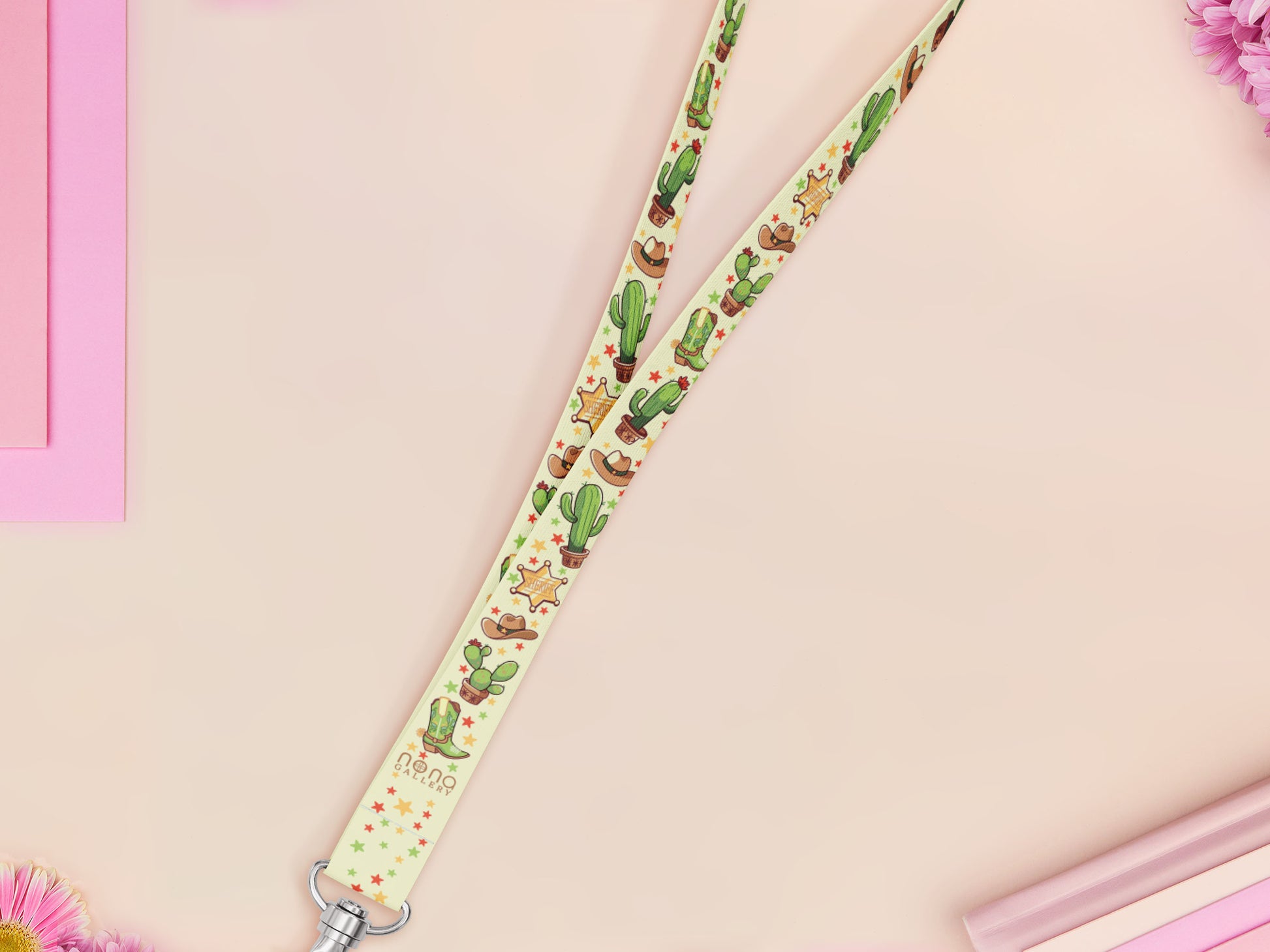 Cute full legth yellow and green lanyard with a double sided cowboy western and cactus themed pattern and silver swivel hook clasp.
