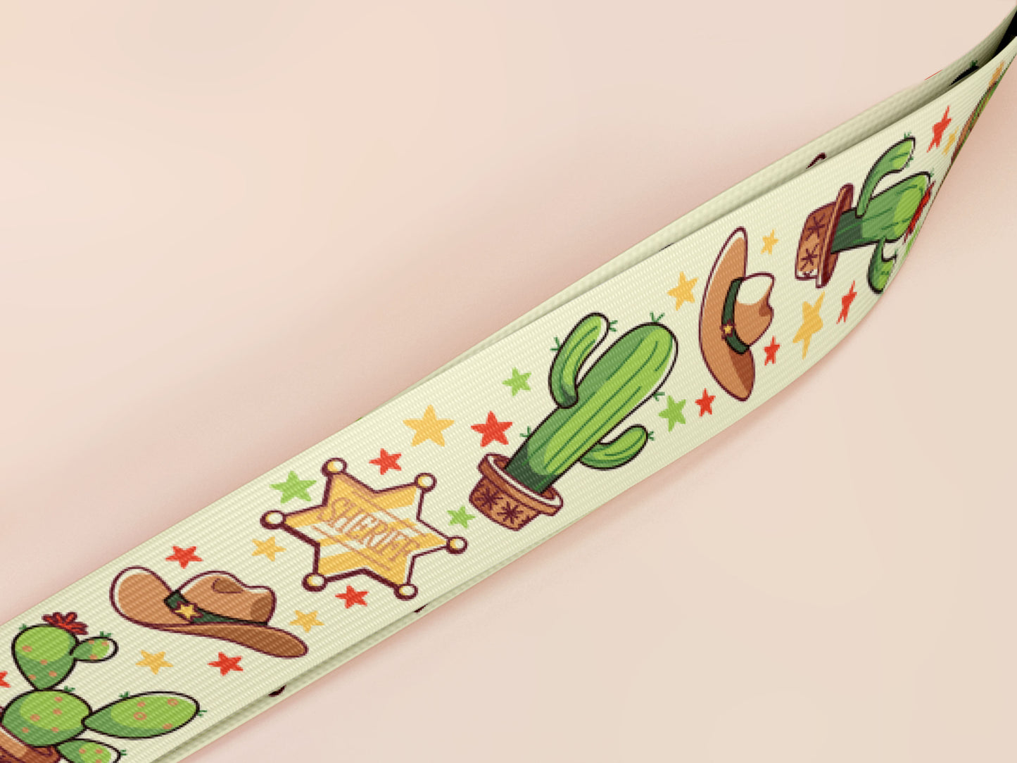 Cute full legth yellow and green lanyard with a double sided cowboy western and cactus themed pattern and silver swivel hook clasp.