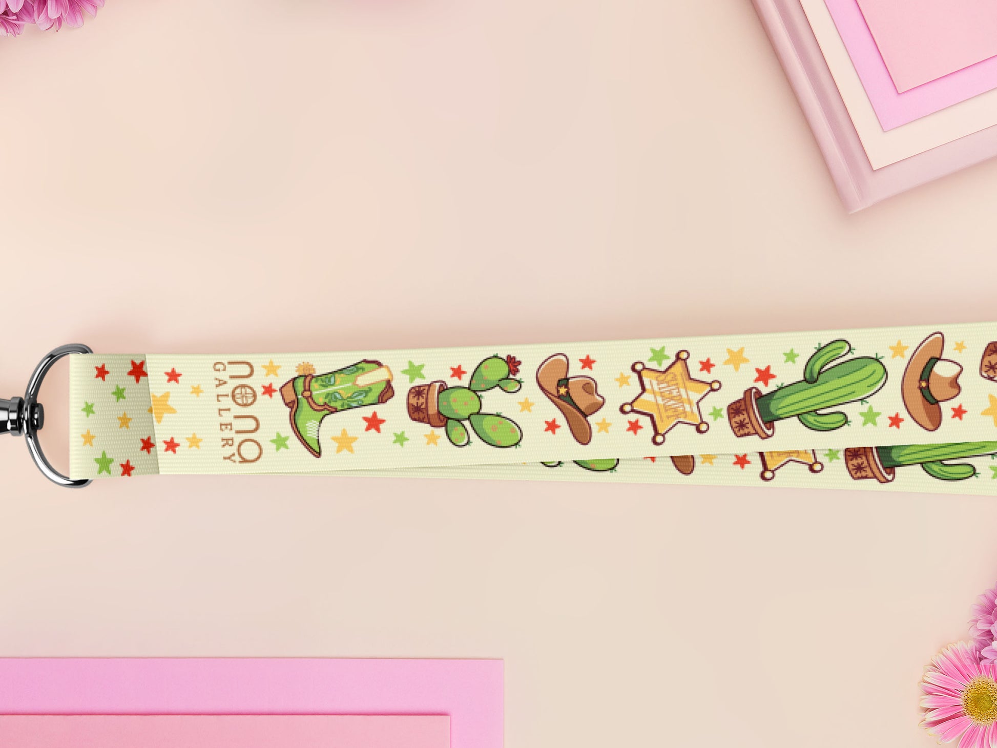 Cute full legth yellow and green lanyard with a double sided cowboy western and cactus themed pattern and silver swivel hook clasp.