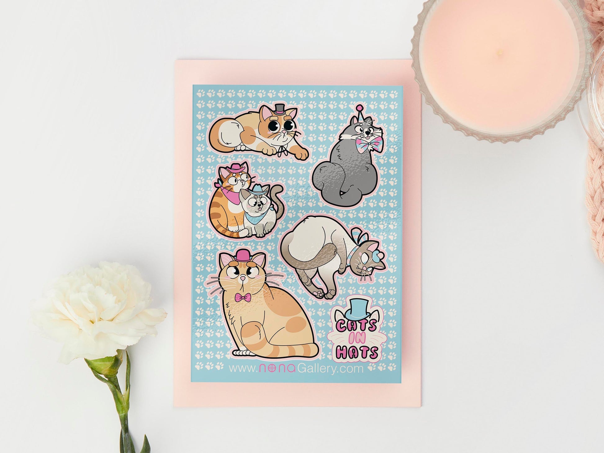 Large sticker sheet of digital illustration cartoons of various cute cats wearing different hats, such as rag dolls, Siamese, grey, ginger, calico and striped cats and kittens