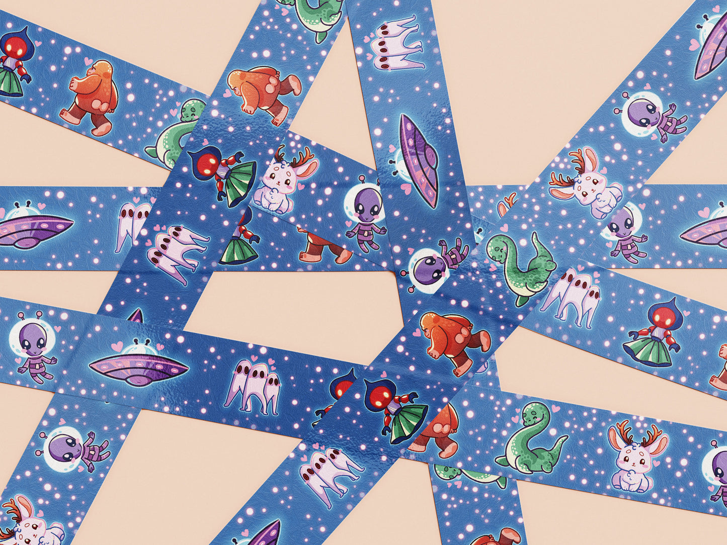 Cute blue cryptids and aliens pattern washi tape.