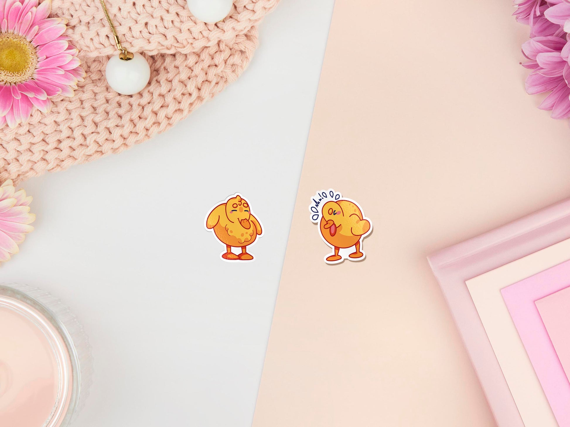 Two stickers of digitally illustrated cartoon of small yellow ducklings