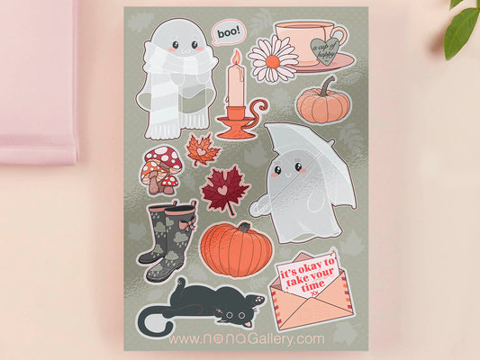 Large sticker sheet of digital illustration cartoon of ghosts, mushrooms, leaves, pumpkins, tea, wellington boots, black cats and other assorted autumn items