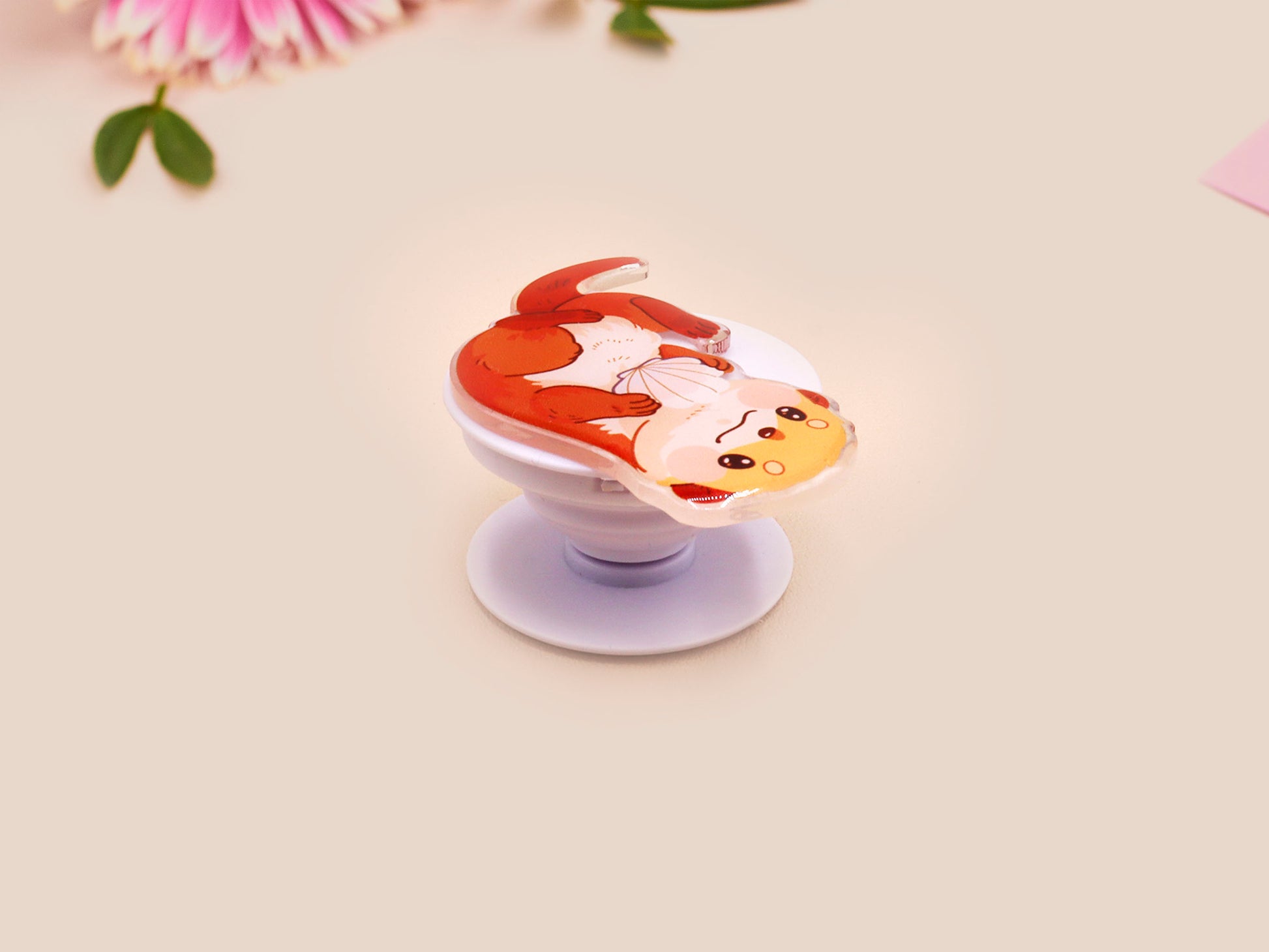 Cute acrylic popsocket phone grip of a sea otter holding a clam shell