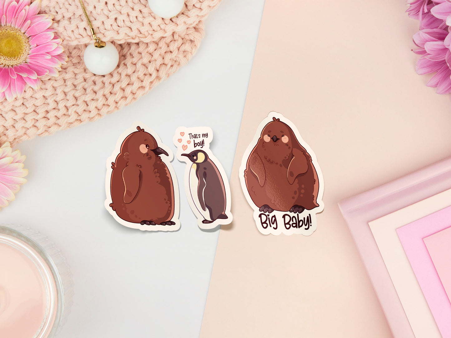 Multiple waterproof gloss vinyl stickers of the internet viral penguin Pesto the big baby emperor penguin chick and his proud dad.