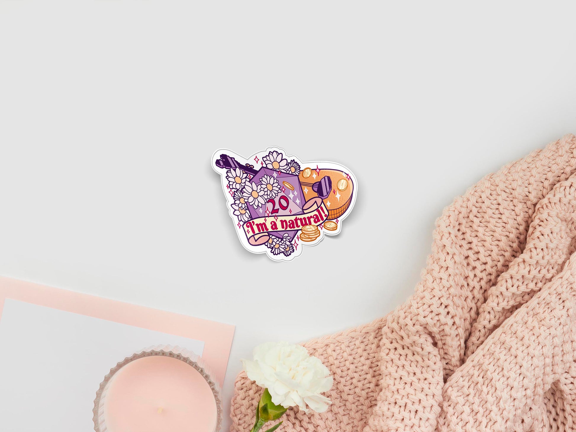 Large sticker of digital illustration cartoons of a natural 20 on a d20 dice, a bards lute, gold coins and daisy flowers, with a banner quote that reads I'm a natural surrounded by sparkles