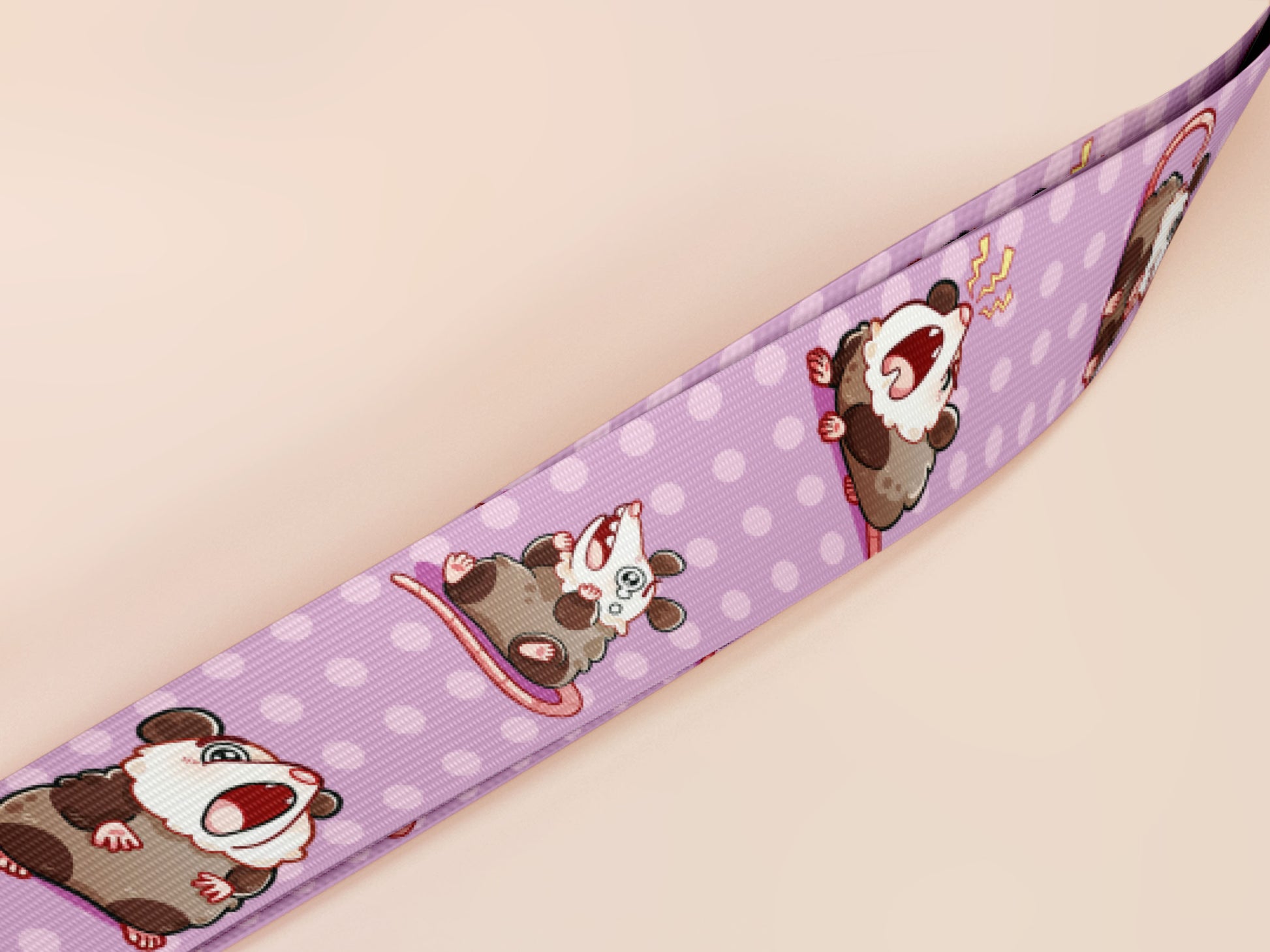 Cute full legth purple lanyard with a double sided funny screaming possums  pattern and silver swivel hook clasp.