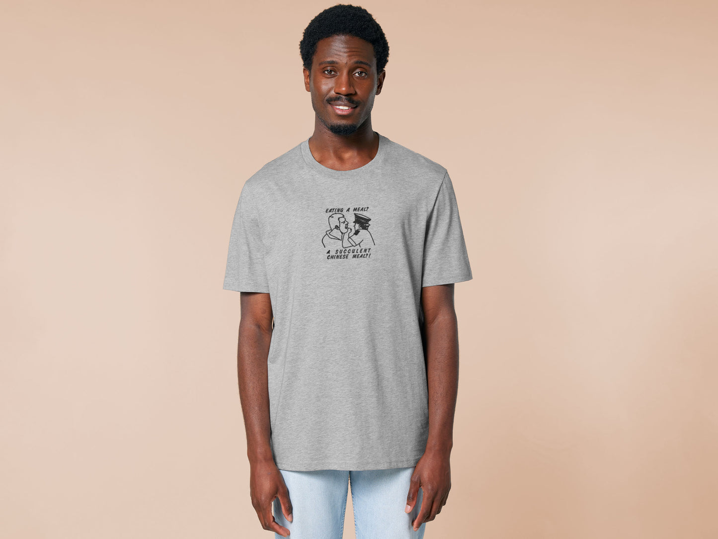 An embroidered light grey t-shirt design of the Australian Jack Karlson being arrested while he shouts Eating A Meal? A Succulent Chinese Meal?!