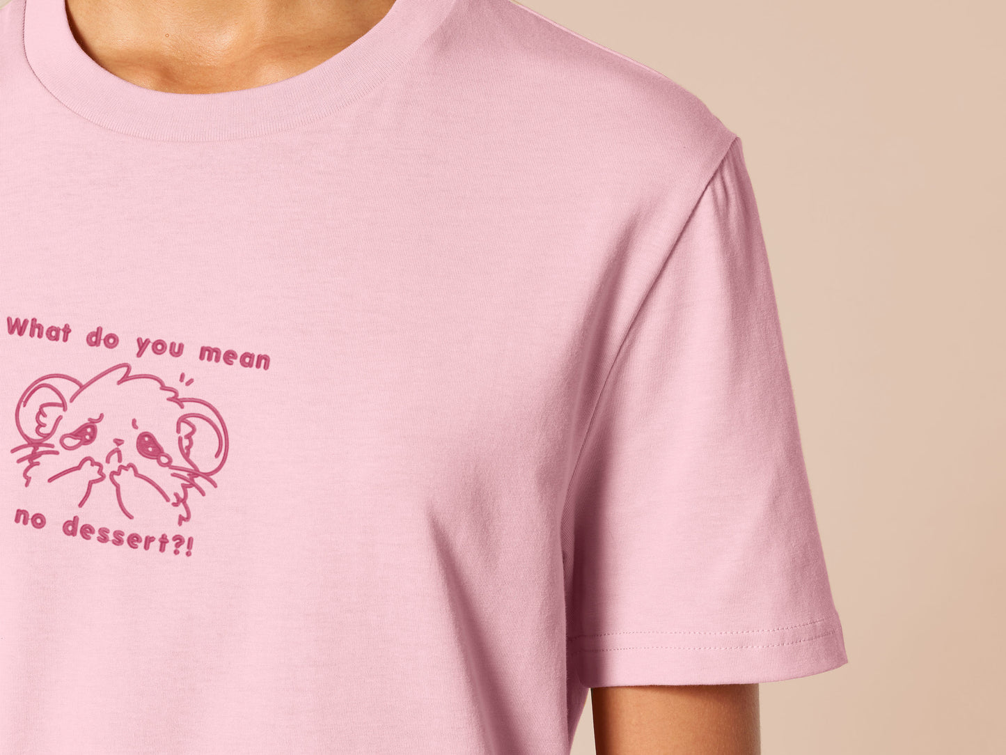 T-shirt with an emboirded Pink Design of a crying chibi hamster wit the text what do you mean no dessert?!