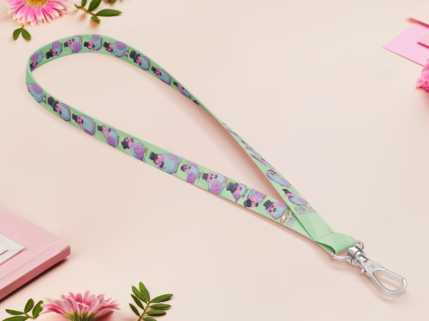 Cute full legth lanyard with a double sided fancy bird pigeon pattern and silver swivel hook clasp.