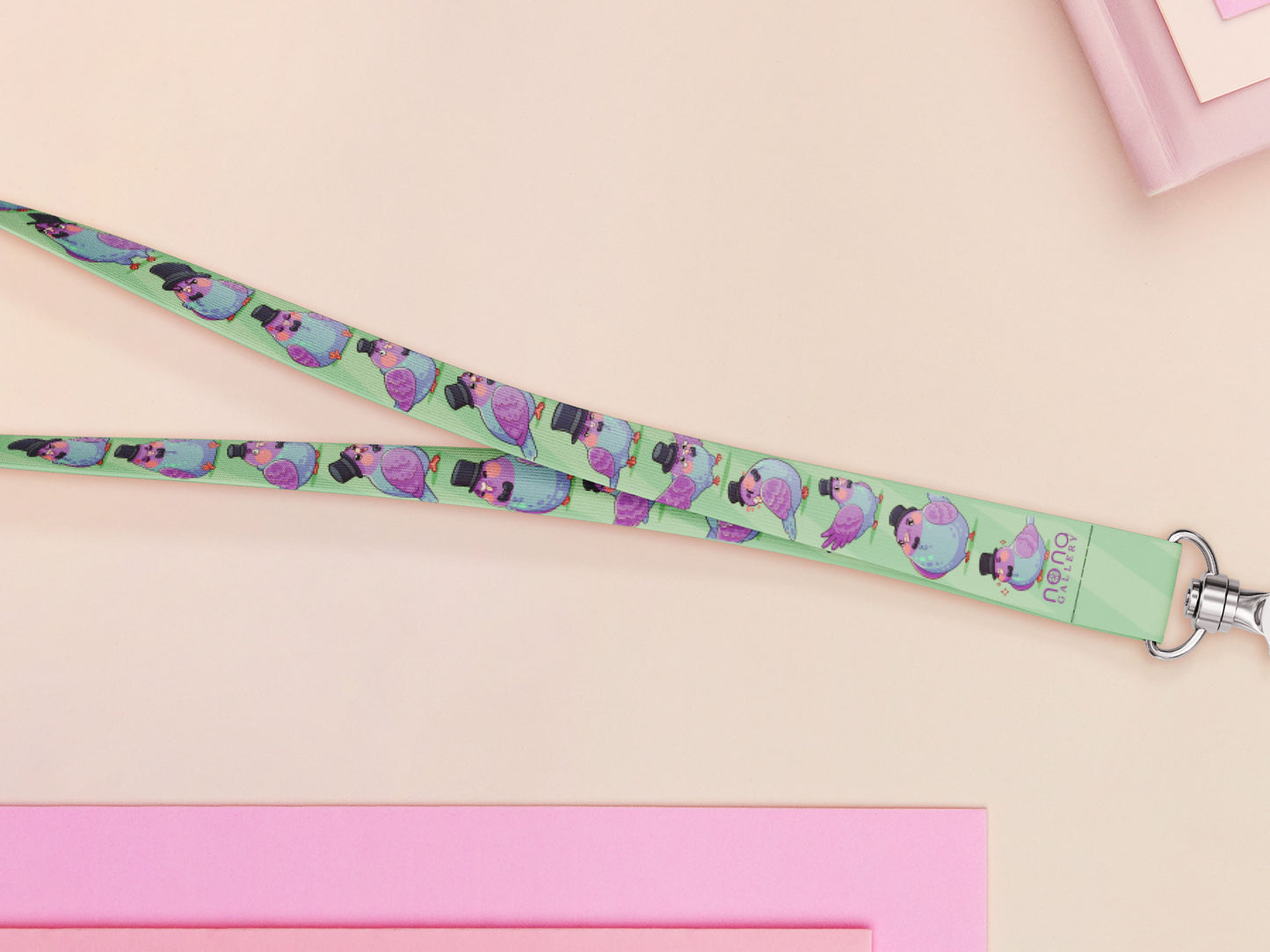 Cute full legth lanyard with a double sided fancy bird pigeon pattern and silver swivel hook clasp.