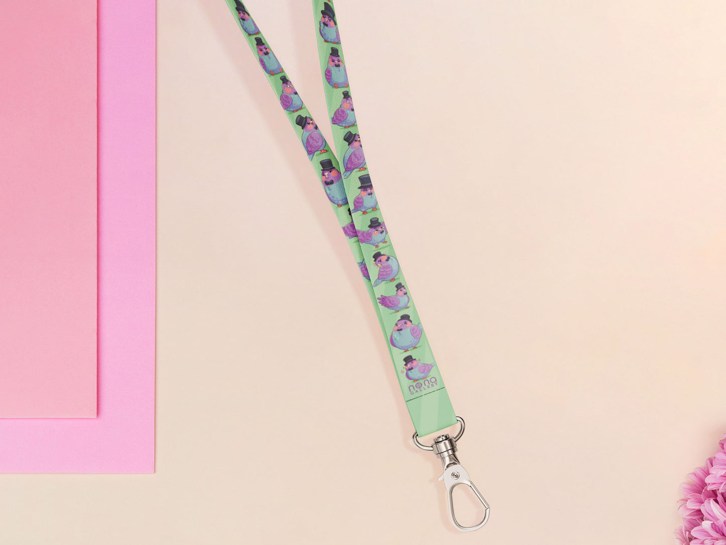 Cute full legth lanyard with a double sided fancy bird pigeon pattern and silver swivel hook clasp.