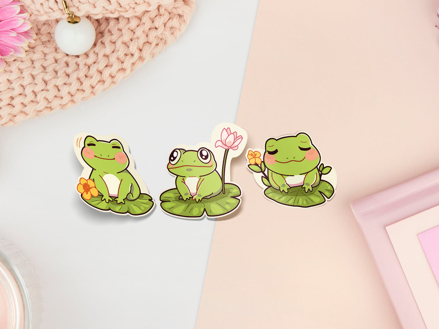 A pastel coloured gloss vinyl stickers of multiple cute frogs and lily pad