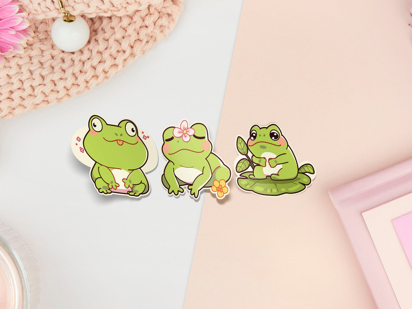A pastel coloured gloss vinyl stickers of multiple cute frogs and lily pad