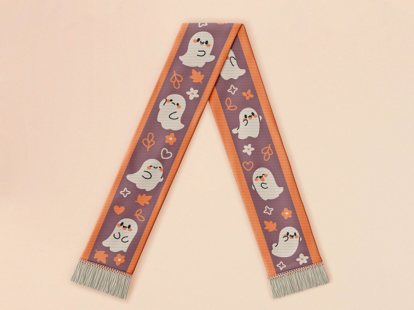 Cute knitted cotton scarf with fringe details and an autumn ghost themed pattern
