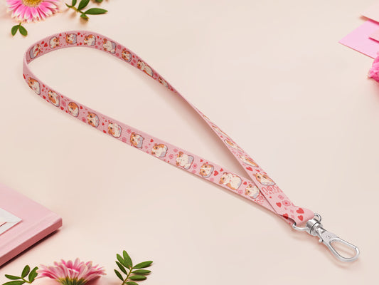 Cute full legth pink lanyard with a double sided guinea pig pattern and silver swivel hook clasp.