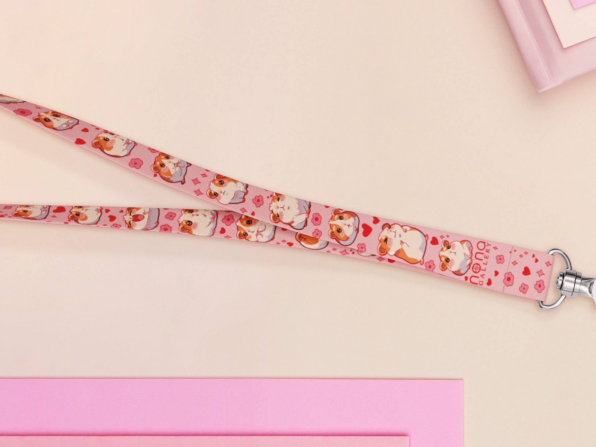 Cute full legth pink lanyard with a double sided guinea pig pattern and silver swivel hook clasp.