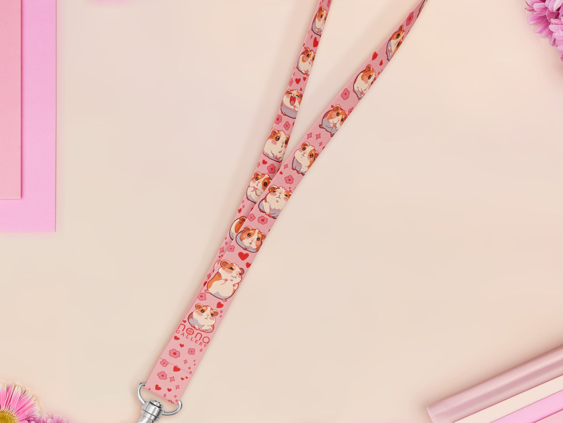 Cute full legth pink lanyard with a double sided guinea pig pattern and silver swivel hook clasp.