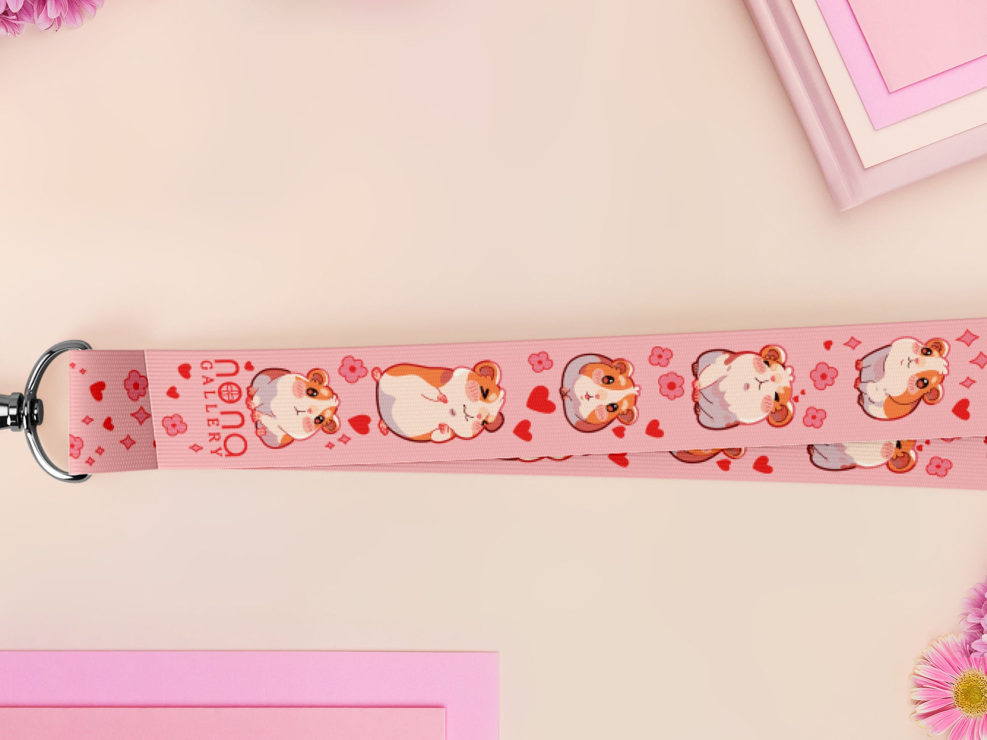 Cute full legth pink lanyard with a double sided guinea pig pattern and silver swivel hook clasp.