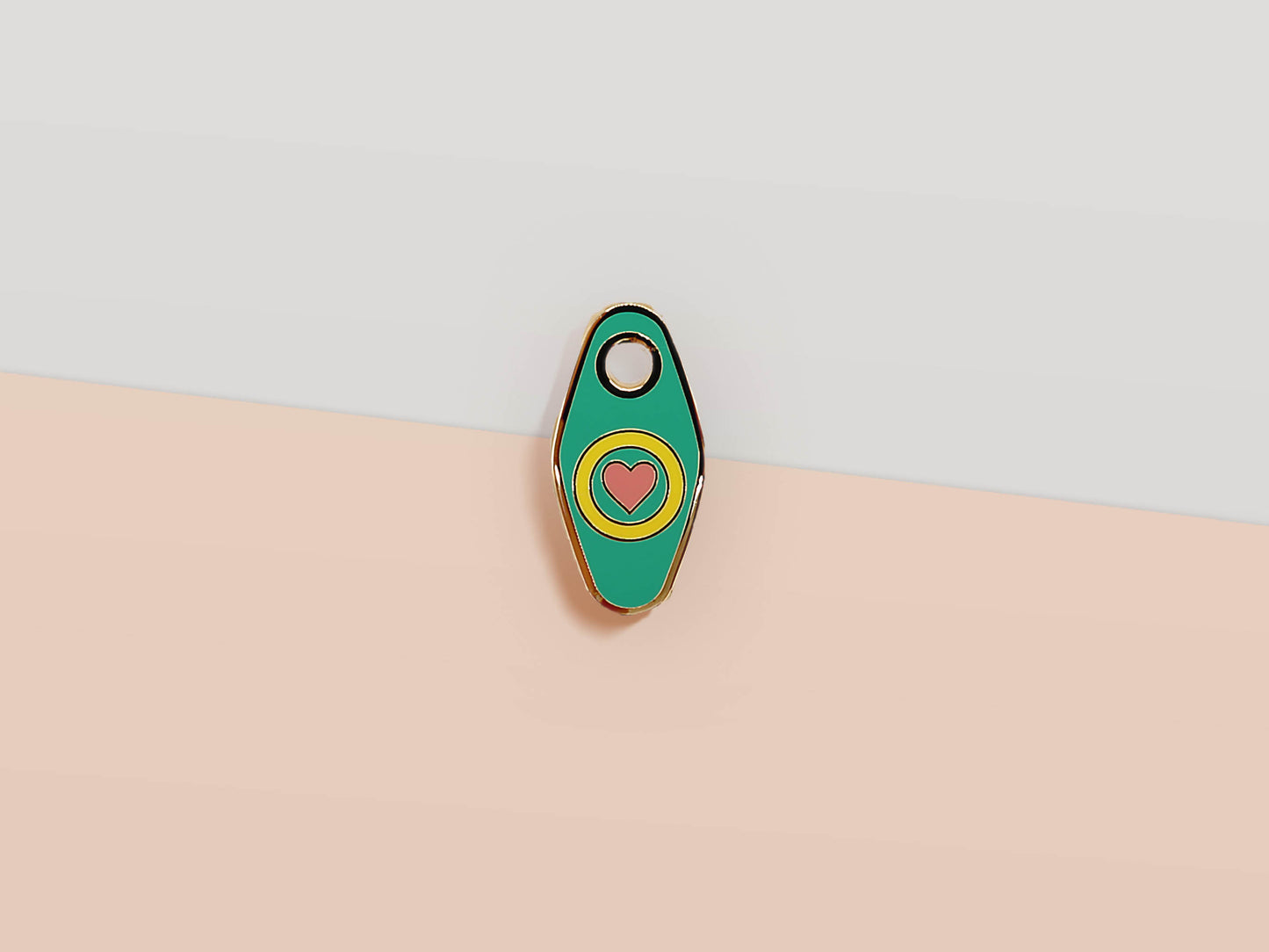 Mini Talisman charm with green, yellow and pink heart design, gold details and a small loop hole.