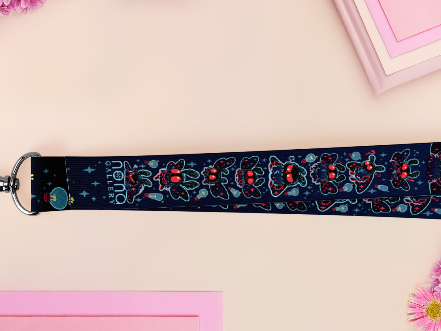 Cute full legth black lanyard with a double sided cute chibi Mothman pattern and silver swivel hook clasp.