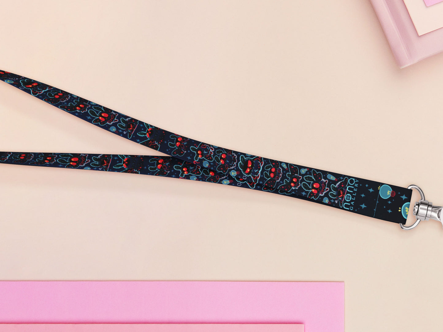 Cute full legth black lanyard with a double sided cute chibi Mothman pattern and silver swivel hook clasp.