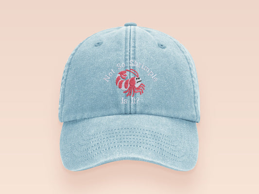 A vintage light blue baseball cap hat with an embroidered cute funny shrimp with the quote not so shrimple is it?