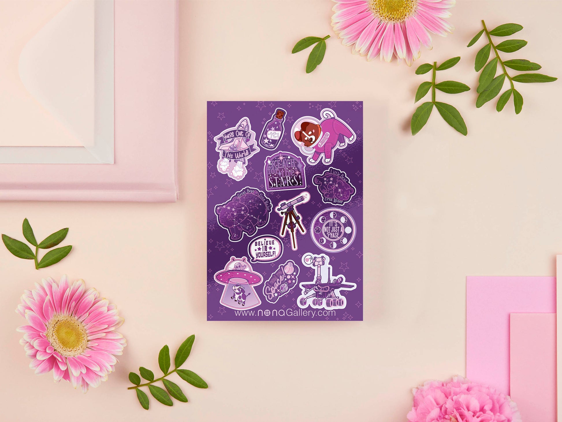 Large purple sticker sheet of digital illustrated cartoons of various space themed items and quotes