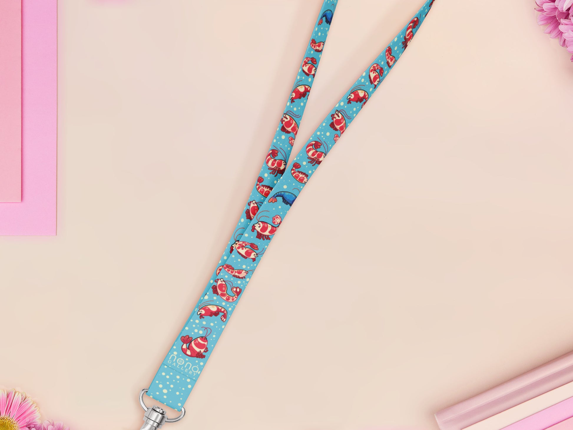 Cute full legth blue lanyard with a double sided prawn shrimp pattern and silver swivel hook clasp.