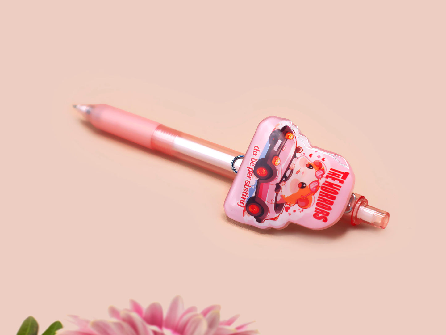 Pink ballpoint pen with black ink and a cute chibi guinea pig hamster design.