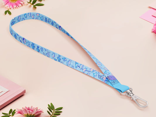 Cute full legth blue lanyard with a double sided underwater fish pattern and silver swivel hook clasp.