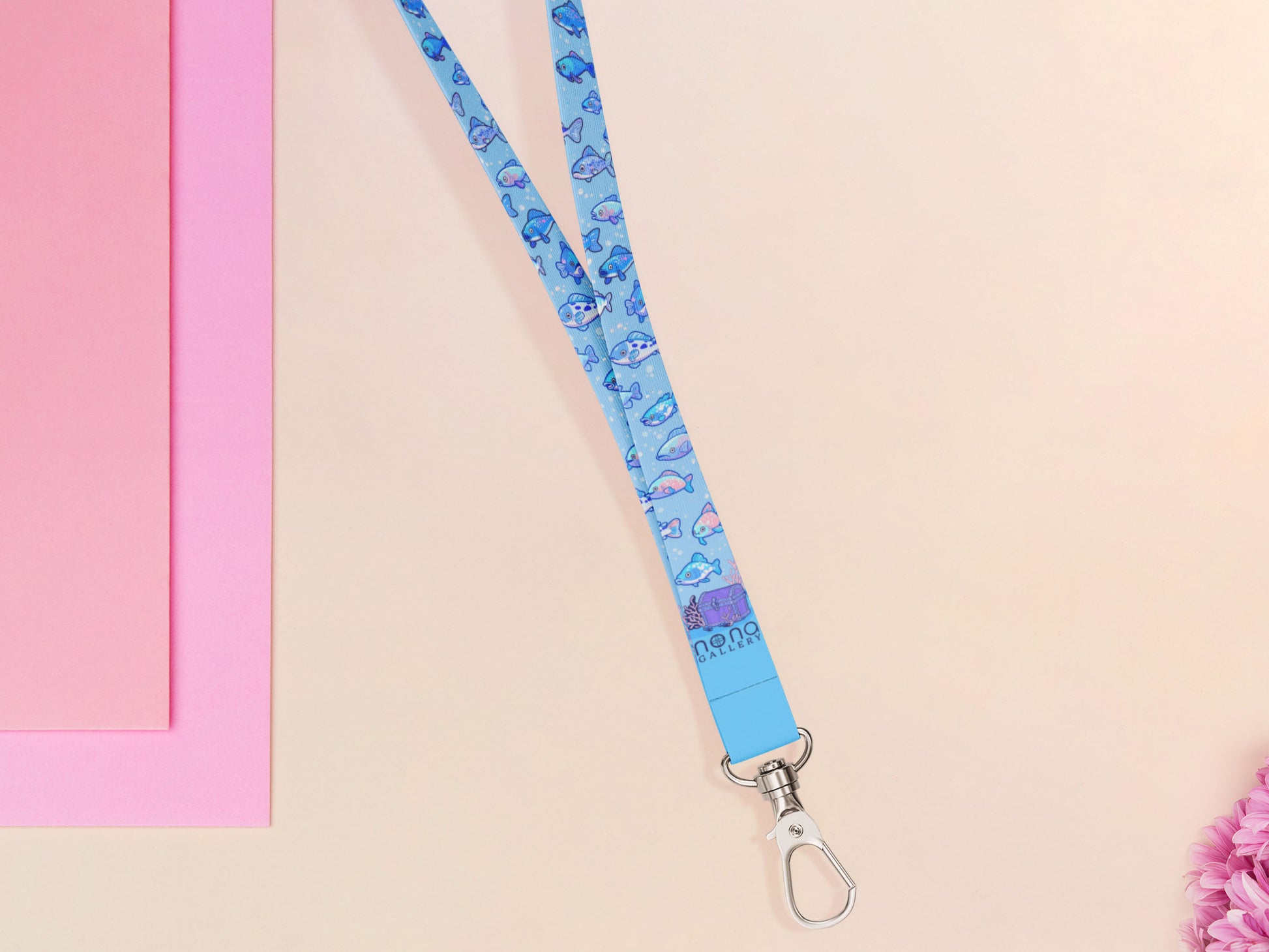 Cute full legth blue lanyard with a double sided underwater fish pattern and silver swivel hook clasp.
