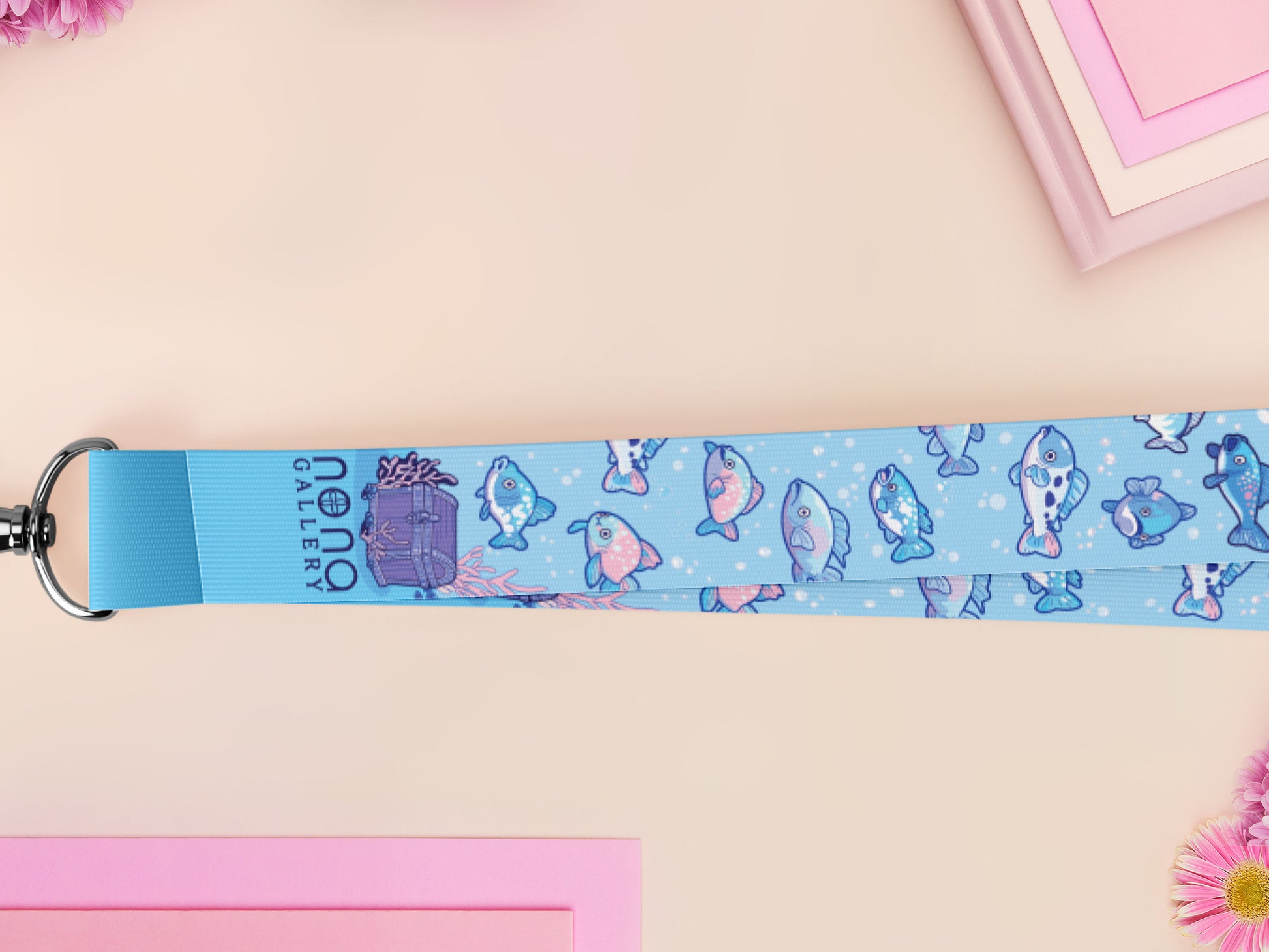 Cute full legth blue lanyard with a double sided underwater fish pattern and silver swivel hook clasp.