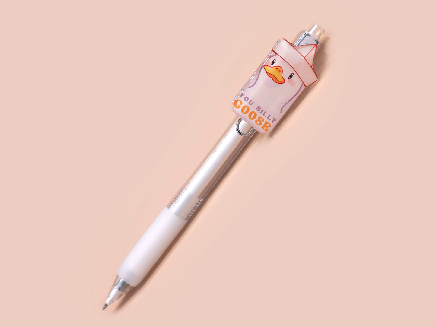 White ballpoint pen with black ink and a cute silly goose design.