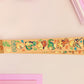 Cute full legth yellow lanyard with a double sided baby dinosuras hatcing from eggs pattern and silver swivel hook clasp.