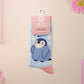 Cute knitted cotton crew socks with a cute baby emperor penguin design.