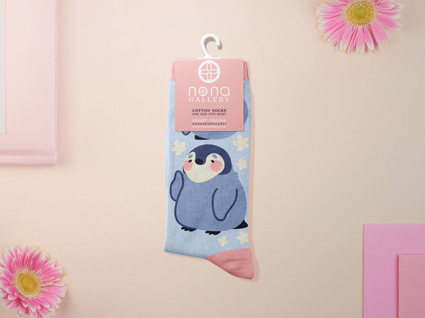 Cute knitted cotton crew socks with a cute baby emperor penguin design.