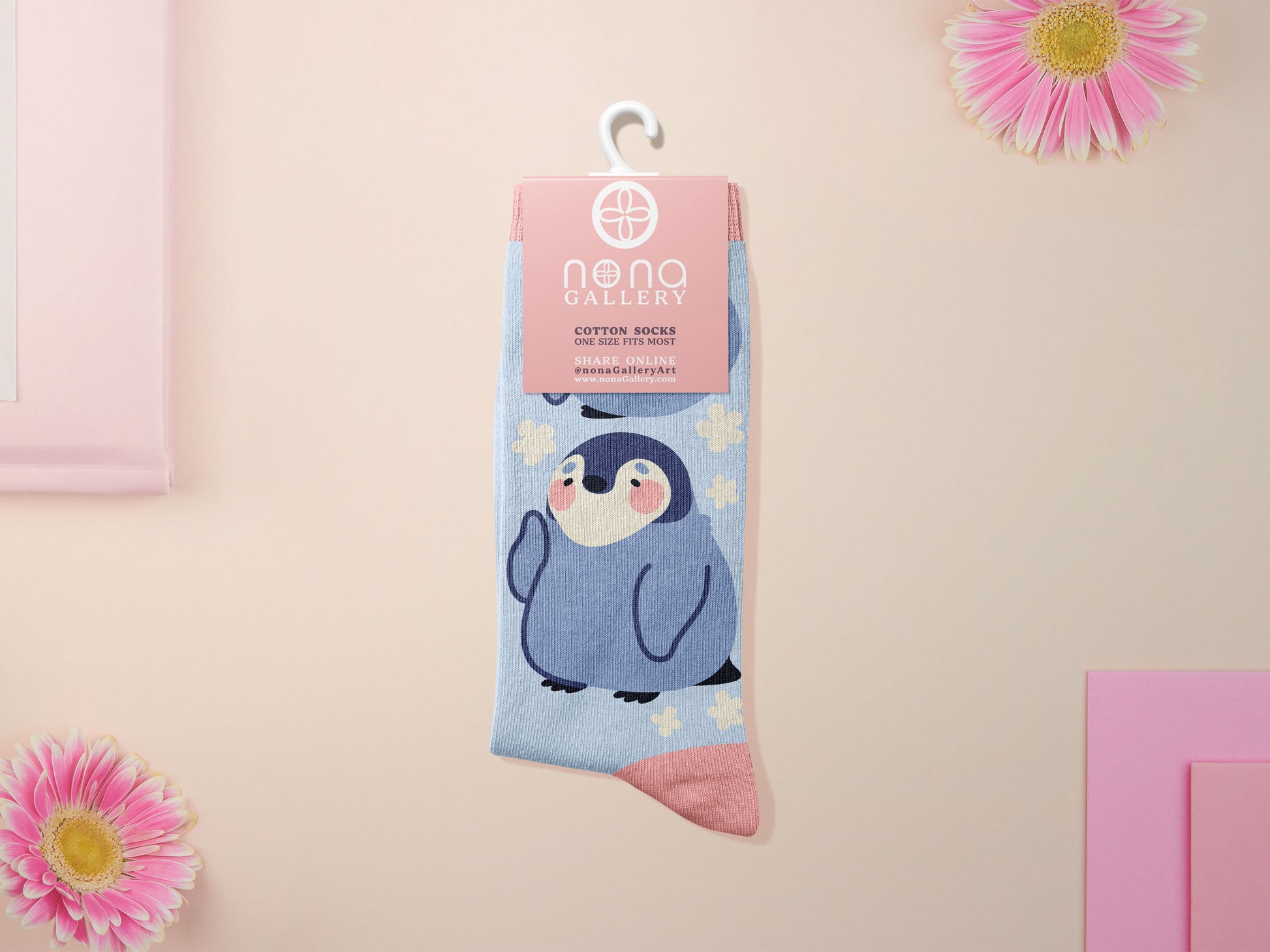Cute knitted cotton crew socks with a cute baby emperor penguin design.