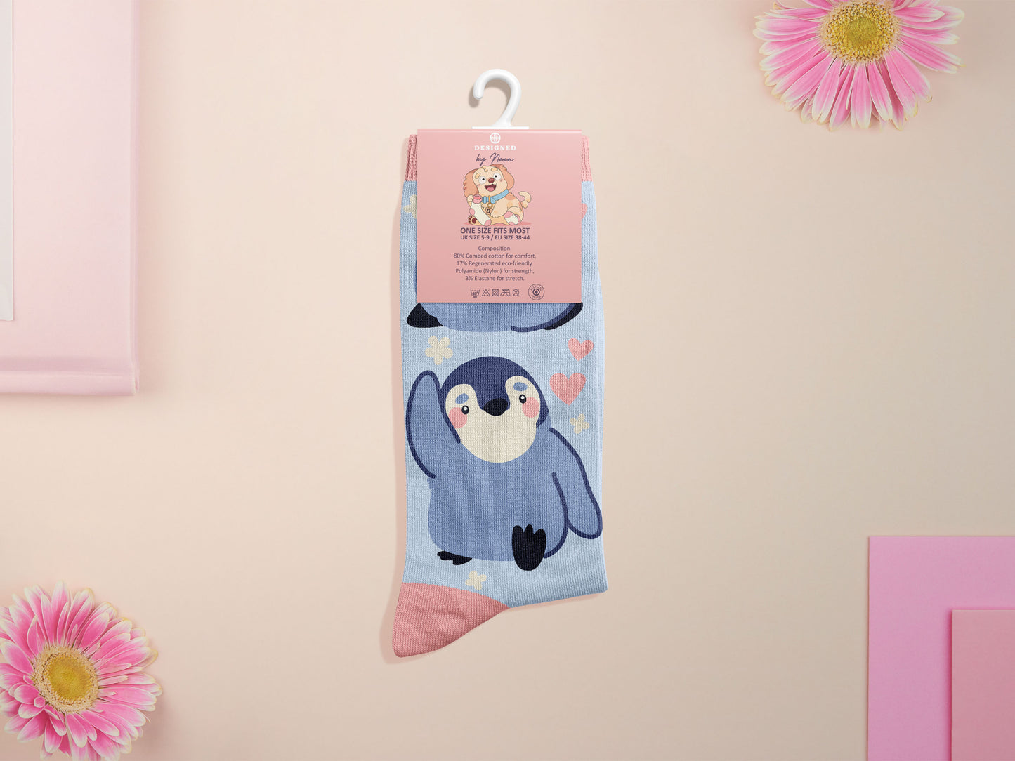 Cute knitted cotton crew socks with a cute baby emperor penguin design.